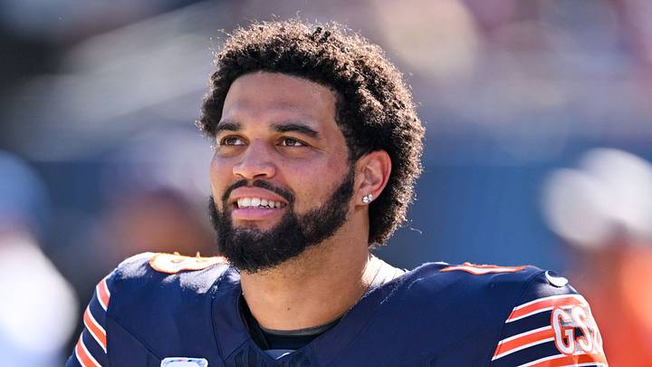 Chicago Bears quarterback Caleb Williams looks on from the sideline