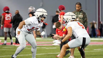Ohio State Buckeyes cornerbacks Bryce West (12) and Devin Sanchez (4) complete a drill during spring football practice at the Woody Hayes Athletic Center in Columbus on March 17, 2025.