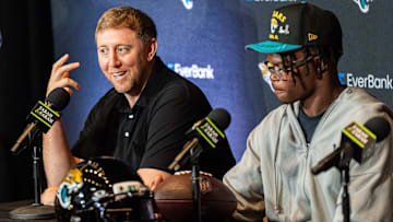 Jacksonville Jaguars Head Coach Liam Coen answers questions during a press conference with the team’s first-round pick, Colorado Buffaloes wide receiver and defensive back Travis Hunter, right, Friday, March 25, 2025 at Miller Electric Center in Jacksonville, Fla. [Doug Engle/Florida Times-Union]