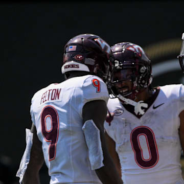 Aug 31, 2024; Nashville, Tennessee, USA;  Virginia Tech Hokies wide receiver Ali Jennings (0) scores off of a broken play against the Vanderbilt Commodores during the second half at FirstBank Stadium. Mandatory Credit: Steve Roberts-Imagn Images