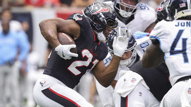 Sep 28, 2025; Houston, Texas, USA; Houston Texans running back Nick Chubb (21) runs with the ball during the third quarter ag