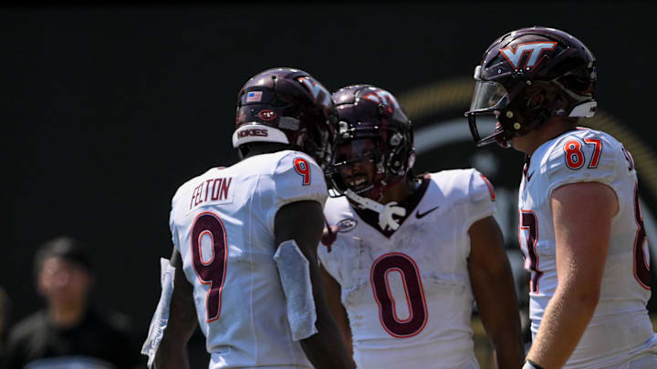 Aug 31, 2024; Nashville, Tennessee, USA;  Virginia Tech Hokies wide receiver Ali Jennings (0) scores off of a broken play against the Vanderbilt Commodores during the second half at FirstBank Stadium. Mandatory Credit: Steve Roberts-Imagn Images