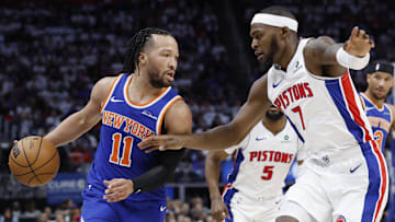 Apr 24, 2025; Detroit, Michigan, USA; New York Knicks guard Jalen Brunson (11) dribbles defended by Detroit Pistons forward Paul Reed (7) in the first half during game three of first round for the 2024 NBA Playoffs at Little Caesars Arena. Mandatory Credit: Rick Osentoski-Imagn Images