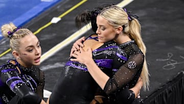 LSU Tigers gymnast Haleigh Bryant hugs LSU Tigers gymnast Olivia Dunne after the 2025 Women's National Gymnastics Semifinal.