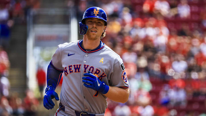 Sep 7, 2025; Cincinnati, Ohio, USA; New York Mets third baseman Brett Baty (7) runs the bases after hitting a solo home run in the third inning against the Cincinnati Reds at Great American Ball Park. Mandatory Credit: Katie Stratman-Imagn Images