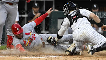 St. Louis Cardinals first baseman Willson Contreras (40) steals home against the Chicago White Sox at Rate Field. 