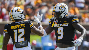 Sept 13, 2025; Columbia, Missouri, USA; Missouri Tigers cornerback Drey Norwood and defensive end Zion Young celebrate a play in the second quarter at Faurot Field.