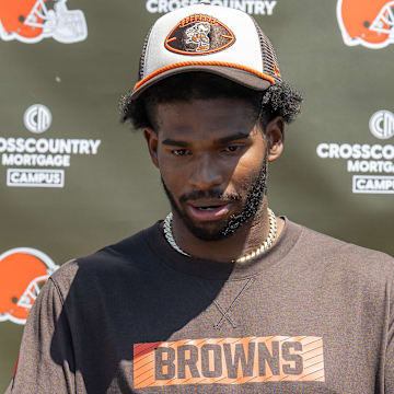 May 10, 2025; Berea, OH, USA; Cleveland Browns quarterback Shedeur Sanders (12) talks to the media during rookie minicamp at CrossCountry Mortgage Campus. Mandatory Credit: Ken Blaze-Imagn Images
