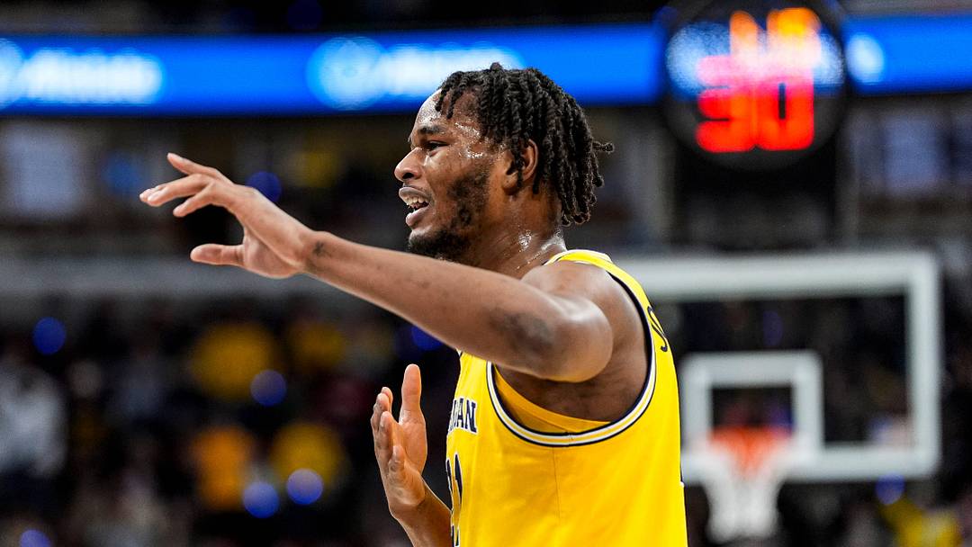 Michigan forward Morez Johnson Jr. (21) celebrates a play against Wisconsin during the first half of Big Ten Tournament semifinal at United Center in Chicago on Saturday, March 14, 2026.