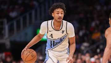 Atlanta Hawks guard Kobe Bufkin dribbles against the Dallas Mavericks in the fourth quarter at State Farm Arena