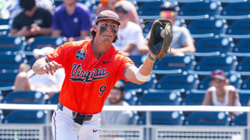 Henry Ford makes a catch during the Virginia baseball game against Florida State at the 2024 College World Series in Omaha.