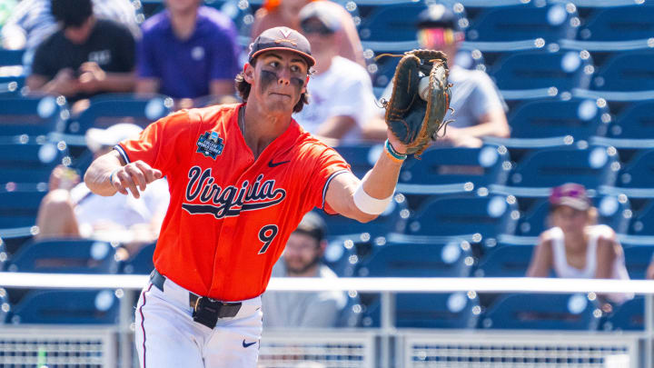 Henry Ford makes a catch during the Virginia baseball game against Florida State at the 2024 College World Series in Omaha.