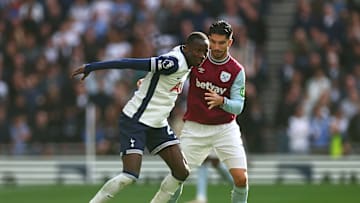 Pape Matar Sarr shields the ball from Carlos Soler