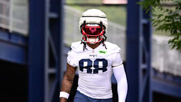 Jul 24, 2024; Foxborough, MA, USA; New England Patriots tight end Jaheim Bell (88) walks to the practice field during training camp at Gillette Stadium. Mandatory Credit: Eric Canha-Imagn Images
