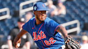 New York Mets pitcher Daison Acosta (62) throws a pitch during the seventh inning against the Houston Astros at The Ballpark of the Palm Beaches on Feb. 25, 2023.