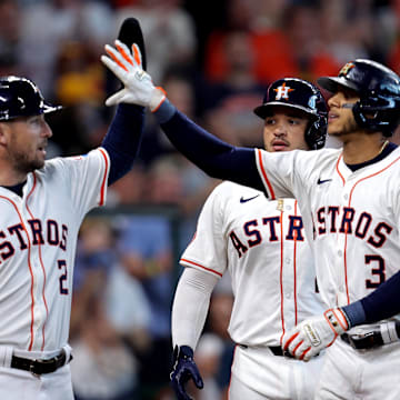 Sep 7, 2024; Houston, Texas, USA; Houston Astros shortstop Jeremy Peña (3) is congratulated by Houston Astros third baseman Alex Bregman (2) after hitting a three-run home run against the Arizona Diamondbacks during the sixth inning at Minute Maid Park. Mandatory Credit: Erik Williams-Imagn Images
