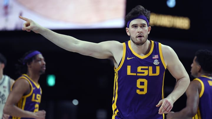 Mar 2, 2024; Nashville, Tennessee, USA; LSU Tigers forward Will Baker (9) celebrates after a basket during the first half against the Vanderbilt Commodores at Memorial Gymnasium. Mandatory Credit: Christopher Hanewinckel-USA TODAY Sports