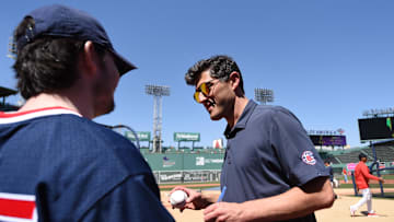 May 13, 2023; Boston, Massachusetts, USA; Boston Red Sox chief baseball officer Chaim Bloom signs an autograph prior to a game against the against the St. Louis Cardinals at Fenway Park. Mandatory Credit: Bob DeChiara-Imagn Images