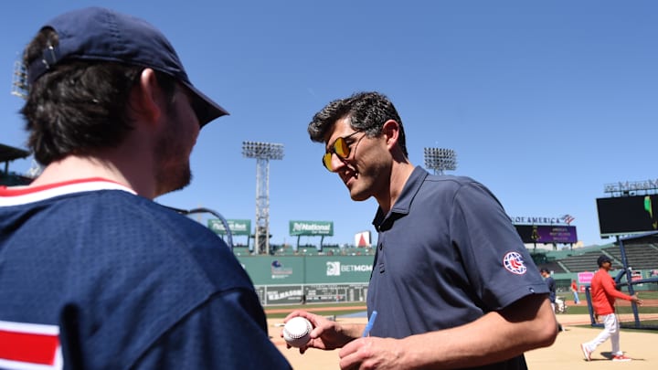 May 13, 2023; Boston, Massachusetts, USA; Boston Red Sox chief baseball officer Chaim Bloom signs an autograph prior to a game against the against the St. Louis Cardinals at Fenway Park. Mandatory Credit: Bob DeChiara-Imagn Images