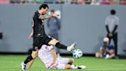 Feb 14, 2025; Tampa, FL, USA; Inter Miami CF forward Lionel Messi (10) shoots the ball against Orlando City in the second half at Raymond James Stadium. Mandatory Credit: Nathan Ray Seebeck-Imagn Images