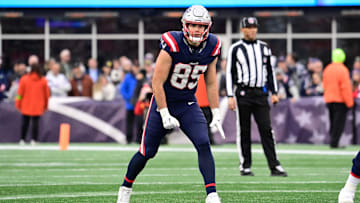 Dec 17, 2023; Foxborough, Massachusetts, USA; New England Patriots tight end Hunter Henry (85) lines