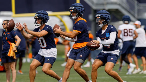 Denver Broncos quarterback Bo Nix (10) and quarterback Jarrett Stidham (8) and quarterback Zach Wilson (4) during training ca