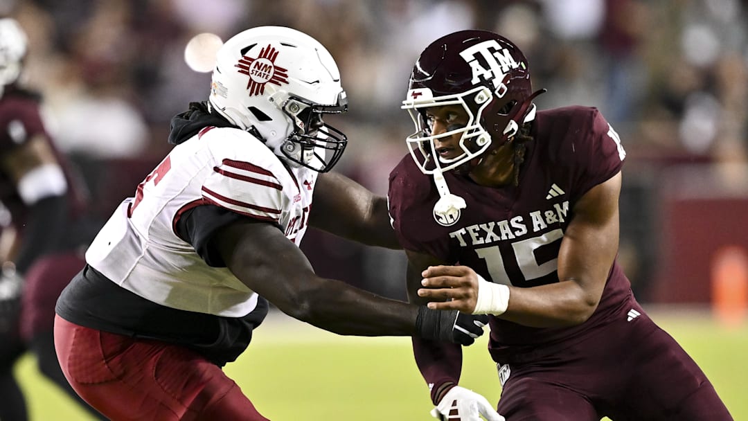 Texas A&M Aggies defensive lineman Rylan Kennedy runs around the edge against the New Mexico State Aggies during the first half at Kyle Field.  