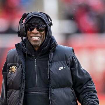 Nov 25, 2023; Salt Lake City, Utah, USA; Colorado Buffaloes head coach Deion 'Coach Prime' Sanders on the field against the Utah Utes at Rice-Eccles Stadium. Mandatory Credit: Christopher Creveling-Imagn Images