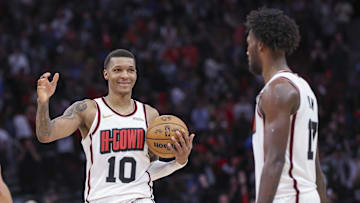 Feb 25, 2025; Houston, Texas, USA; Houston Rockets forward Jabari Smith Jr. (10) smiles and celebrates with forward Tari Eason (17) after the game against the Milwaukee Bucks at Toyota Center. Mandatory Credit: Troy Taormina-Imagn Images