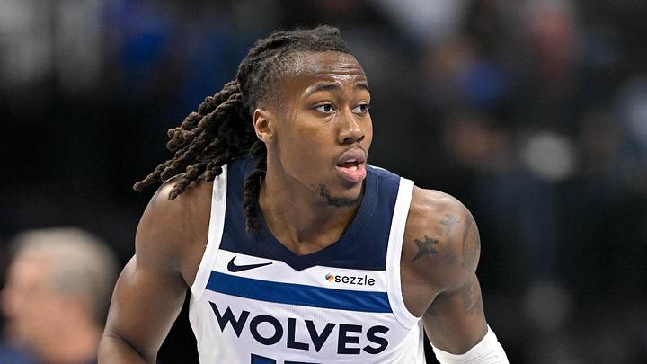 Mar 30, 2026; Dallas, Texas, USA; Minnesota Timberwolves guard Ayo Dosunmu (13) brings the ball up court against the Dallas Mavericks during the second quarter at the American Airlines Center. Mandatory Credit: Jerome Miron-Imagn Images