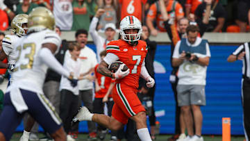 Nov 9, 2024; Atlanta, Georgia, USA; Miami Hurricanes wide receiver Xavier Restrepo (7) catches a pass for a touchdown against the Georgia Tech Yellow Jackets in the fourth quarter at Bobby Dodd Stadium at Hyundai Field. Mandatory Credit: Brett Davis-Imagn Images