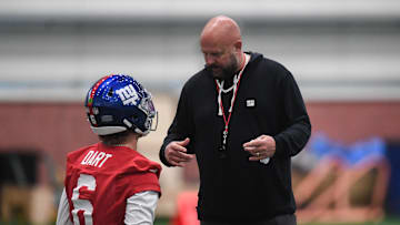 May 9, 2025; East Rutherford, NJ, USA; New York Giants head coach Brian Daboll talks with quarterback Jaxson Dart (6) during rookie minicamp at Quest Diagnostics Training Center. Mandatory Credit: John Jones-Imagn Images