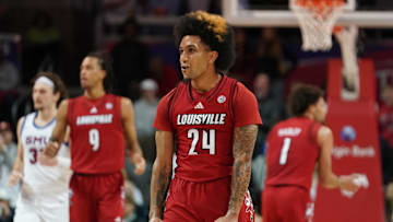 Jan 21, 2025; Dallas, Texas, USA; Louisville Cardinals guard Chucky Hepburn (24) reacts after a made basket against the SMU Mustangs during the second half at Moody Coliseum. Mandatory Credit: Raymond Carlin III-Imagn Images