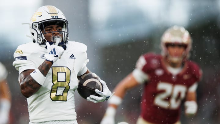 Aug 24, 2024; Dublin, IRL; Georgia Tech wide receiver Malik Rutherford runs with the ball against Florida State  at Aviva Stadium. Mandatory Credit: Tom Maher/INPHO via USA TODAY Sports