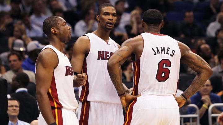 February 3, 2011; Orlando FL, USA; Miami Heat small forward LeBron James (6), shooting guard Dwyane Wade (3) and power forward Chris Bosh (1) huddle up during the second half against the Orlando Magic at Amway Center.Miami Heat defeated Orlando Magic 104-100. Mandatory Credit: Kim Klement-USA TODAY Sports