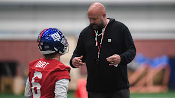May 9, 2025; East Rutherford, NJ, USA; New York Giants head coach Brian Daboll talks with quarterback Jaxson Dart (6) during rookie minicamp at Quest Diagnostics Training Center. Mandatory Credit: John Jones-Imagn Images