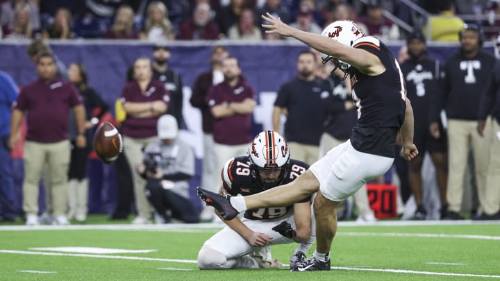 Dec 27, 2023; Houston, TX, USA; Oklahoma State Cowboys place kicker Alex Hale (19) 