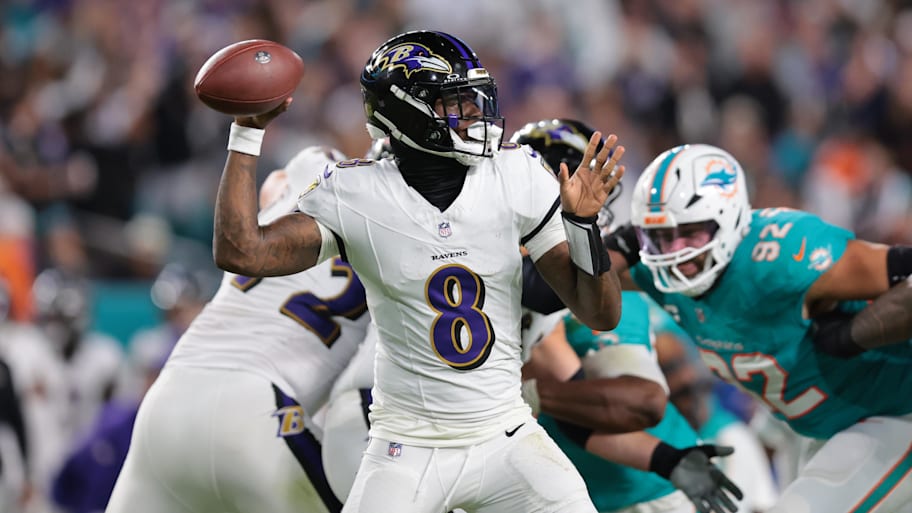 Baltimore Ravens quarterback Lamar Jackson (8) throws downfield during the second quarter against the Miami Dolphins.