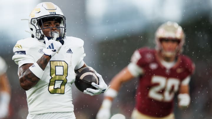 Aug 24, 2024; Dublin, IRL; Georgia Tech wide receiver Malik Rutherford runs with the ball against Florida State at Aviva Stadium. Mandatory Credit: Tom Maher/INPHO via USA TODAY Sports