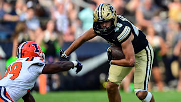 Purdue Boilermakers running back Devin Mockobee (45) runs with the ball against Illinois Fighting Illini 