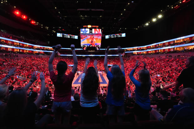 Kentucky volleyball and Nebraska volleyball fans cheered on their team during the AVCA First Serve Showcase at the KFC Yum!