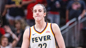 Jul 9, 2025; Indianapolis, Indiana, USA; Indiana Fever guard Caitlin Clark (22) in the first half against Golden State Valkyries at Gainbridge Fieldhouse. Mandatory Credit: Trevor Ruszkowski-Imagn Images