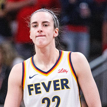 Jul 9, 2025; Indianapolis, Indiana, USA; Indiana Fever guard Caitlin Clark (22) in the first half against Golden State Valkyries at Gainbridge Fieldhouse. Mandatory Credit: Trevor Ruszkowski-Imagn Images