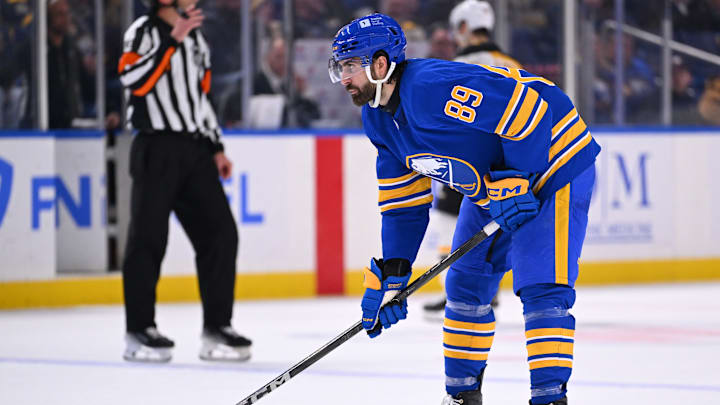 Alex Tuch (89) at ther face-off circle in a game against the Boston Bruins. 