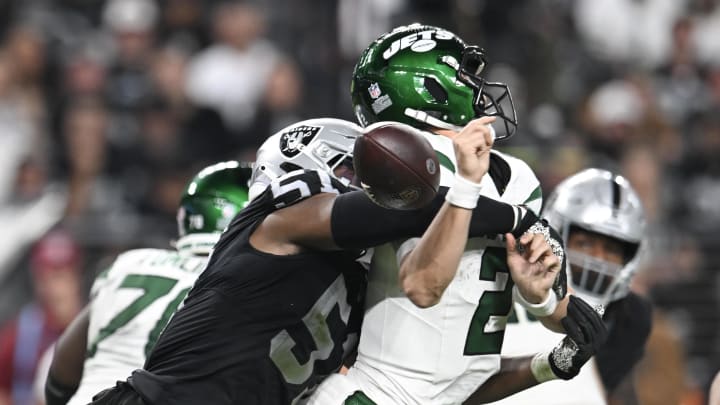 Nov 12, 2023; Paradise, Nevada, USA; Las Vegas Raiders defensive end Malcolm Koonce (51) causes a forced fumble on New York Jets quarterback Zach Wilson (2) in the fourth quarter at Allegiant Stadium. Mandatory Credit: Candice Ward-USA TODAY Sports