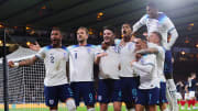 England celebrate scoring against Scotland at Hampden Park
