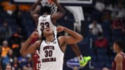 Mar 14, 2024; Nashville, TN, USA; South Carolina Gamecocks forward Collin Murray-Boyles (30) celebrates after a dunk by forward Josh Gray (33) during the second half against the Arkansas Razorbacks at Bridgestone Arena. Mandatory Credit: Christopher Hanewinckel-USA TODAY Sports