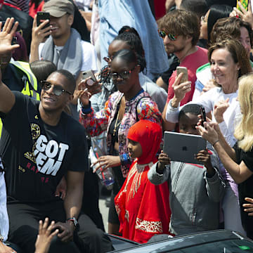 Jun 17, 2019; Toronto, Ontario, Canada; Toronto Raptors president Masai Ujiri waves to the crowd during the Toronto Raptors Championship Parade. Mandatory Credit: Nick Turchiaro-Imagn Images