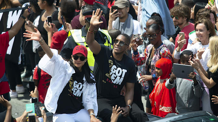 Jun 17, 2019; Toronto, Ontario, Canada; Toronto Raptors president Masai Ujiri waves to the crowd during the Toronto Raptors Championship Parade. Mandatory Credit: Nick Turchiaro-Imagn Images