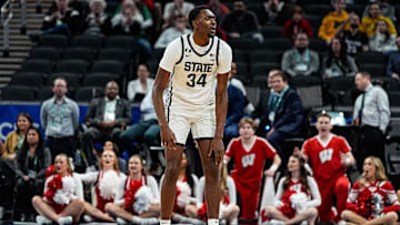Michigan State forward Xavier Booker (34) reacts after a play against Wisconsin during the first half of Big Ten Tournament semifinal at Gainbridge Fieldhouse in Indianapolis, Ind. on Saturday, March 15, 2025.
